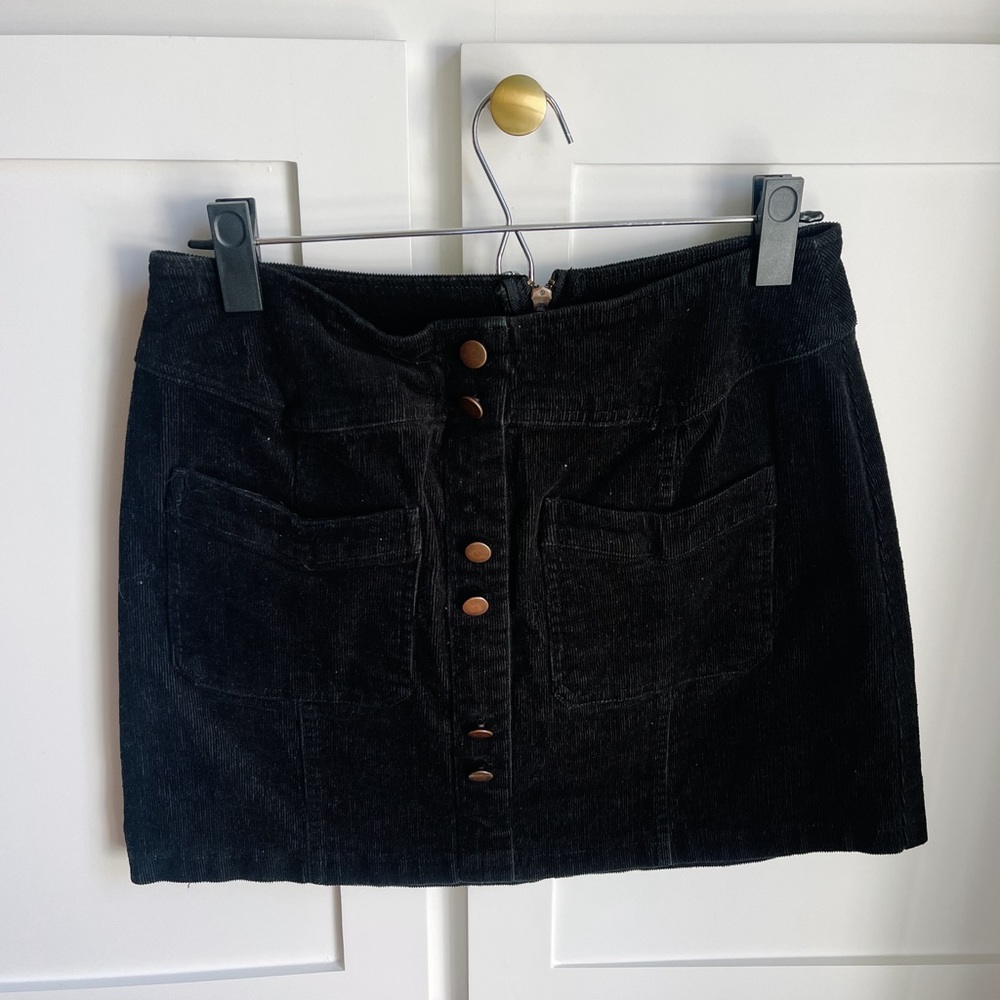This is a black skirt with soft fabric! Fairly new worn once!